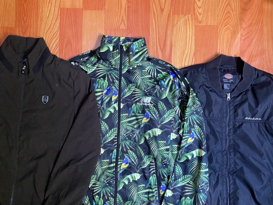 Jackets Munsingwear New Balance Dickies (Category: Coats, Jackets and Outerwear) located in Cebu City. Submitted by monflor (Listing ID 1469524549, Image 2). Description: 3 men's jackets, all clean and ready to wear - Munsingwear Dark Brown Zip Jacket: Size L, classic fit - New Balance Tropical Jungle Leaf & Parrot Print Zip Jacket: Size XL, vibrant statement piece - Dickies Black Nylon Bomber Jacket: Size M, features a practical utility sleeve p