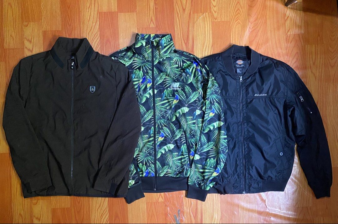 Jackets Munsingwear New Balance Dickies (Category: Coats, Jackets and Outerwear) located in Cebu City. Submitted by monflor (Listing ID 1469524549, Image 1). Description: 3 men's jackets, all clean and ready to wear - Munsingwear Dark Brown Zip Jacket: Size L, classic fit - New Balance Tropical Jungle Leaf & Parrot Print Zip Jacket: Size XL, vibrant statement piece - Dickies Black Nylon Bomber Jacket: Size M, features a practical utility sleeve p