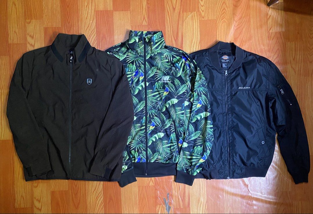 Jackets Munsingwear New Balance Dickies (Category: Coats, Jackets and Outerwear) located in Cebu City. Submitted by monflor (Listing ID 1469524549, Image 3). Description: 3 men's jackets, all clean and ready to wear - Munsingwear Dark Brown Zip Jacket: Size L, classic fit - New Balance Tropical Jungle Leaf & Parrot Print Zip Jacket: Size XL, vibrant statement piece - Dickies Black Nylon Bomber Jacket: Size M, features a practical utility sleeve p