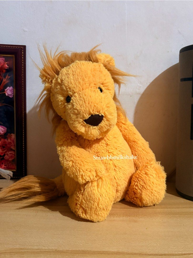 Jellycat Original Bashful Lion (Category: Plushies & Soft Toys) located in Manila. Submitted by strawbbmilkshake (Listing ID 1469424114, Image 1). Description: ☀️Rare Original Bashful lion, please see 2nd and 3rd picture. ☀️May black lines po sa toes and hands which is the original version of the bashful lion. ☀️Sunshine yellow color in person! ☀️squishy ng body niya, super soft. ☀️Collector’s item po ito. ☀️Recently washed and sanitized. Slightl