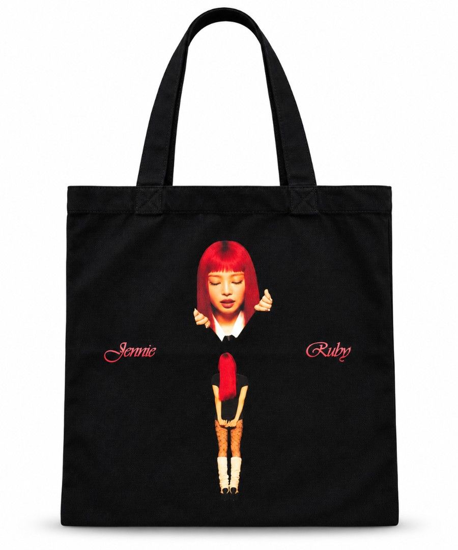 Jennie x Ruby Album Canvas Tote Bag (Category: K-Wave Merchandise) located in Pasig City. Submitted by swipeandpicks (Listing ID 1469512369, Image 1). Description: • Color: Black (with a vibrant graphic print featuring Jennie's red hair and "Jennie Ruby" typography text) • Material: High-quality, durable Canvas fabric • Approximate Size: L15.4*W13.5inch (Great capacity for tablets, books, and daily items).