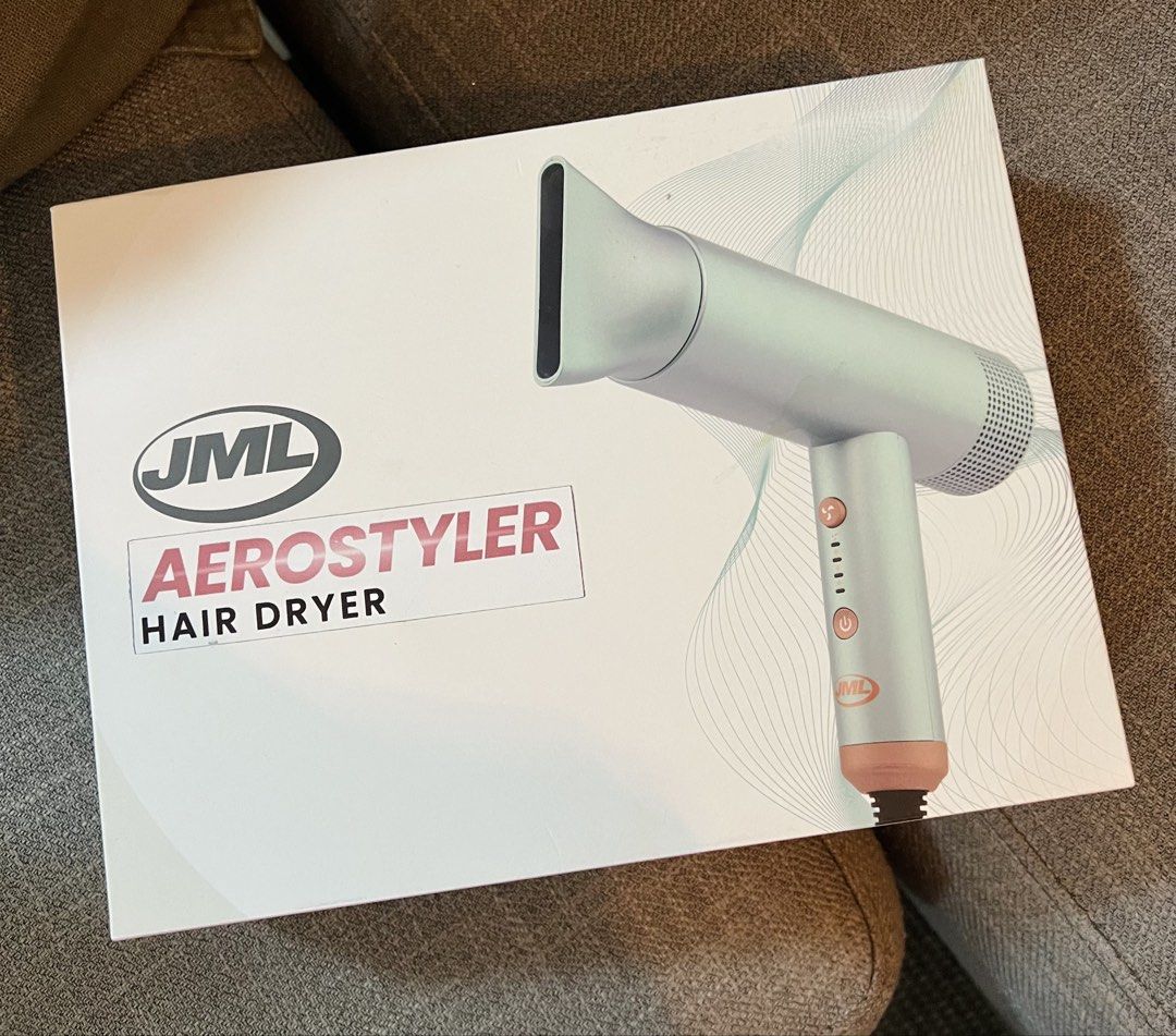 JML Aero Styler Hair Dryer (Category: Hair) located in Taguig. Submitted by littlejamillescloset (Listing ID 1469559526, Image 1). Description: - Brand: JML Aero Styler hair dryer - Condition: Like new with light scratches, used 2-5x, bought in 2024 - Inclusions: Detachable styling nozzle and power cord with velcro strap - Retail Price: Over 3,000 PHP in local stores - Perfect for daily blowouts and styling routines.