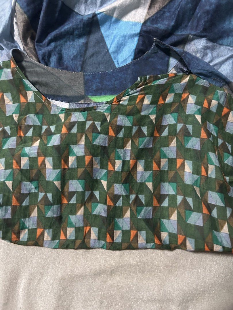 JNBY (Category: Dresses) located in Davao. Submitted by sart0ria85 (Listing ID 1469556145, Image 3). Description: Bodycon dress in geometric pattern in blue, green, and brown on a mid-length cut. 78% COTTON 22%SILK MADE IN CHINA MEDIUM. Size 6 EXCELLENT CONDITION (95/100).