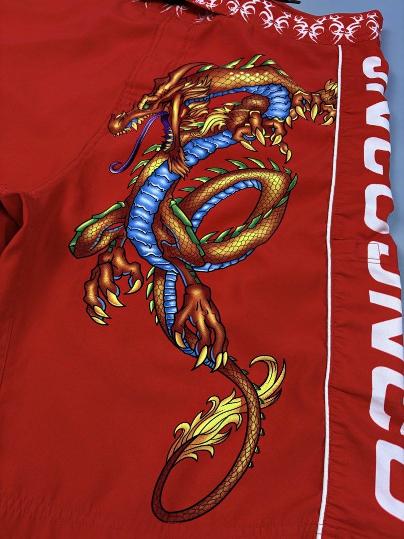 JNCO DRAGON (Category: Shorts) located in Manila. Submitted by _remyboyz (Listing ID 1469421556, Image 2). Description: JNCO dragon board shorts Measurement Size:36/22/13 Color rate:10/10 Condition:Excellent condition Flaw/Issue:None .