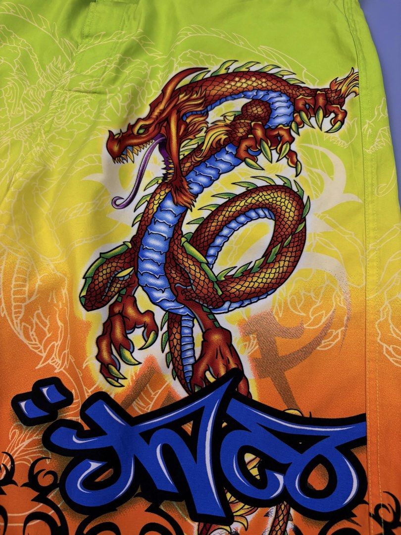 JNCO DRAGON (Category: Shorts) located in Manila. Submitted by _remyboyz (Listing ID 1469421804, Image 3). Description: JNCO dragon board shorts Measurement Size:34/22/12 Color rate:10/10 Condition:Excellent condition Flaw/Issue:None .