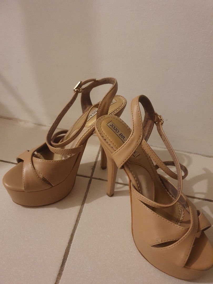 Jojo Bragais Nude Platform Heels Stilettos (Category: Heels) located in Manila. Submitted by dixiecrooz (Listing ID 1469551135, Image 2). Description: - Brand: Jojo Bragais - Style: Strappy platform heels with high stiletto - Details: Cross-strap toe design, ankle strap with buckle closure - Color: Versatile nude (matches everything!) - Condition: Excellent / Like new - Perfect for events, parties, or glam looks.