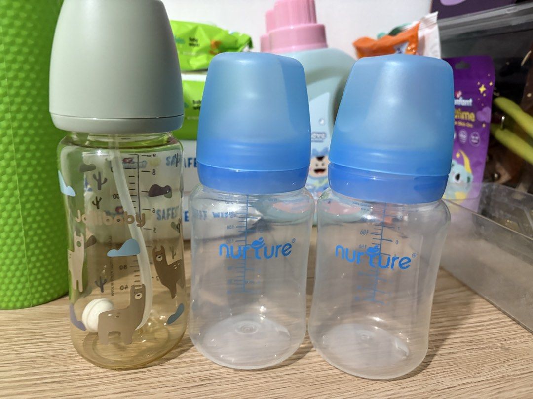 Jollibaby PPSU Straw Bottle and Nurture Bottles Bundle (Category: Breastfeeding & Bottle Feeding) located in Manila. Submitted by chamendoza79060 (Listing ID 1469550693, Image 1). Description: - Bundle of 3 clear plastic baby feeding bottles in great, clean condition - 1x Jollibaby straw bottle (270ml capacity) featuring adorable llama prints - 2x Nurture baby bottles with secure blue caps and nipple attachments - Includes clear measurement marki