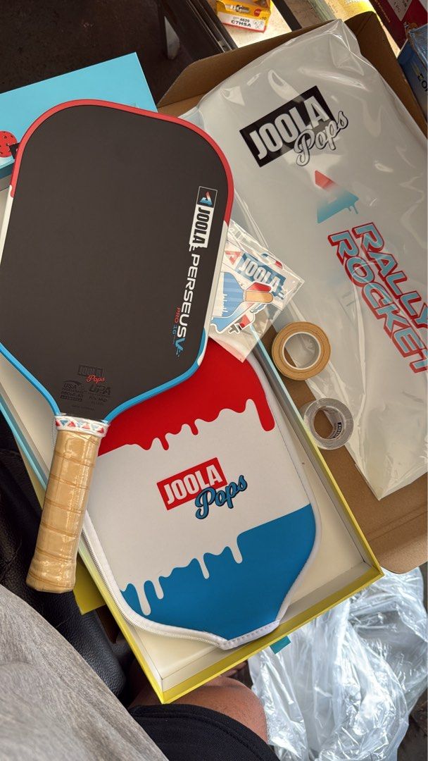 JOOLA POPS PERSEUS V (Category: Racket and Ball Sports) located in Manila. Submitted by carloreyesg (Listing ID 1469452367, Image 1). Description: Inopen lang ang box complete inclusion Box Ziplock Extra joola ppf Extra joola griptape Joola pops cover Sticker Still sealed pa din po paddle .