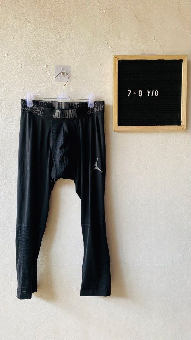 Jordan Black Kids Leggings (Category: Babies & Kids Fashion) located in Caloocan City. Submitted by lovemyclothes21 (Listing ID 1469416625, Image 1). Description: - Brand: Jordan - Size: Kids 7-8 years old - Color: Classic black with grey elastic waistband featuring Jordan wordmark - Branding: Metallic silver Jumpman logo on the left leg - Ventilation: Breathable mesh panels at the front crotch and lower calves - Ideal for: Sports practice, baske