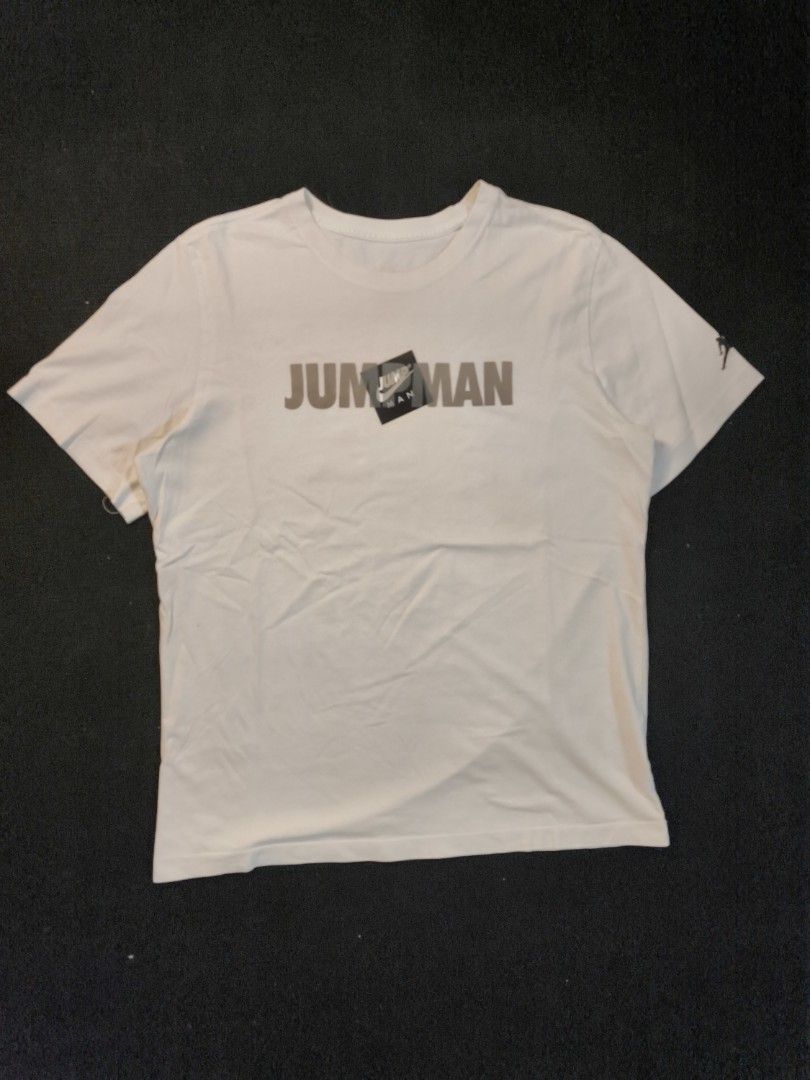 Jordan Jumpman Script White Tee (Category: Tshirts & Polo Shirts ) located in San Fernando. Submitted by retro_d (Listing ID 1469559861, Image 2). Description: - Jordan Jumpman Script white tee - Size: Medium (W21.5/L26.5) - Condition: Excellent - Color Rate: 9.5/10 - No issue.