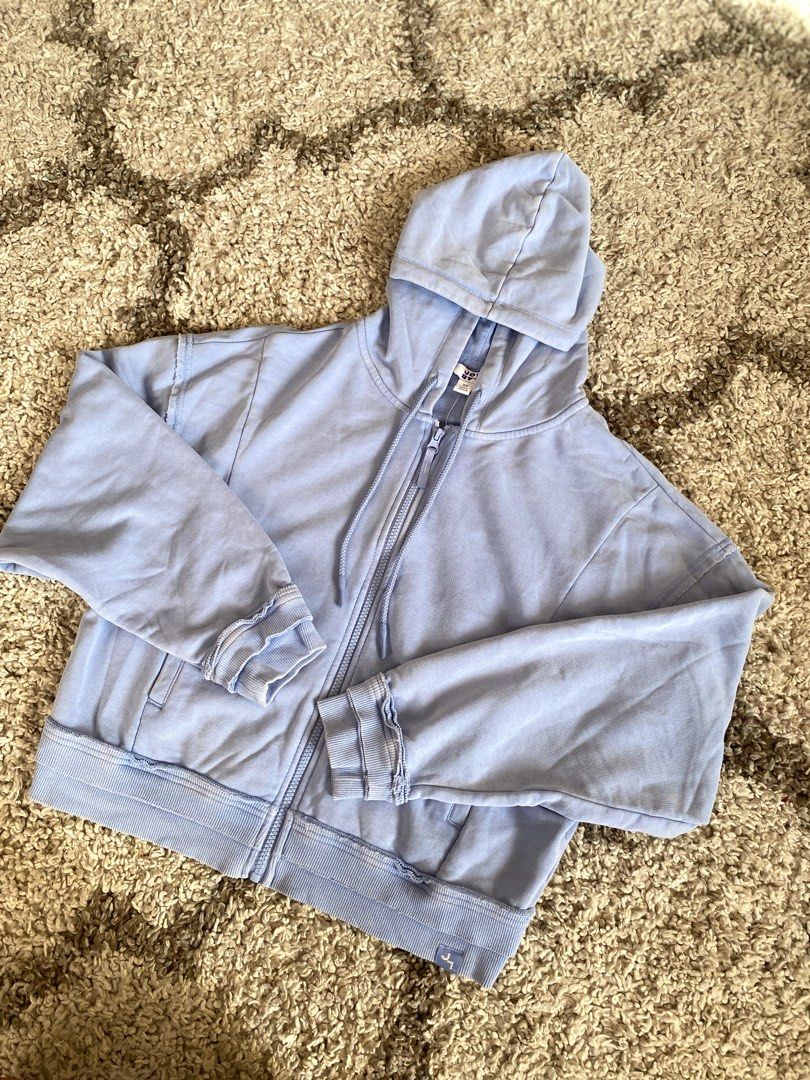 JoyLab Cropped Zip-Up Hoodie Hydrangea Blue (Category: Coats, Jackets and Outerwear) located in Batangas. Submitted by lux_kimmy (Listing ID 1469421901, Image 2). Description: - Brand: JoyLab - Item: Cropped zip-up hoodie - Color: Hydrangea blue - Size: Extra Small (XS) - Condition: Brand new with original retail tags - Original Price: $30 (approx. ₱1,750) - Features: Super soft fabric, raw-edge seam details, drawstring hood, and front pockets.