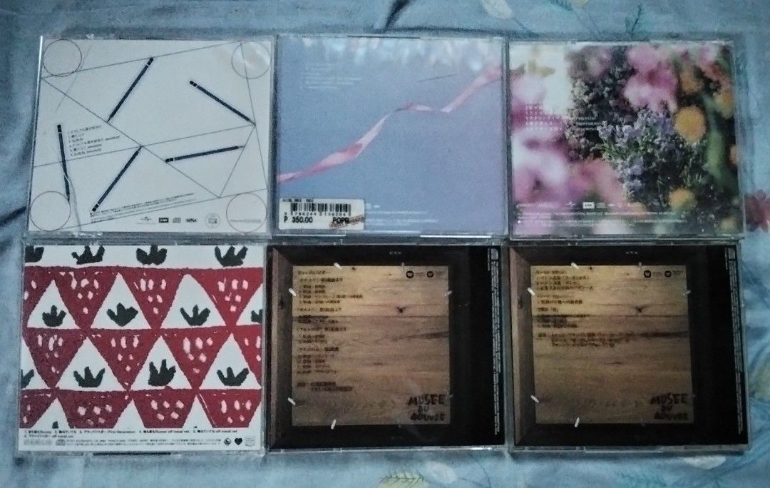 J-Pop cds With OBI Complete (Take All) (Category: CDs & DVDs) located in Bani. Submitted by dreik12345 (Listing ID 1469428251, Image 2). Description: JPOP Cds featuring AKB48 61st,62nd and 63rd Singles, Mint Condition Except sa cases, may crack and ung dalawa na cd, di ko kilala yung artist, Selling as is.