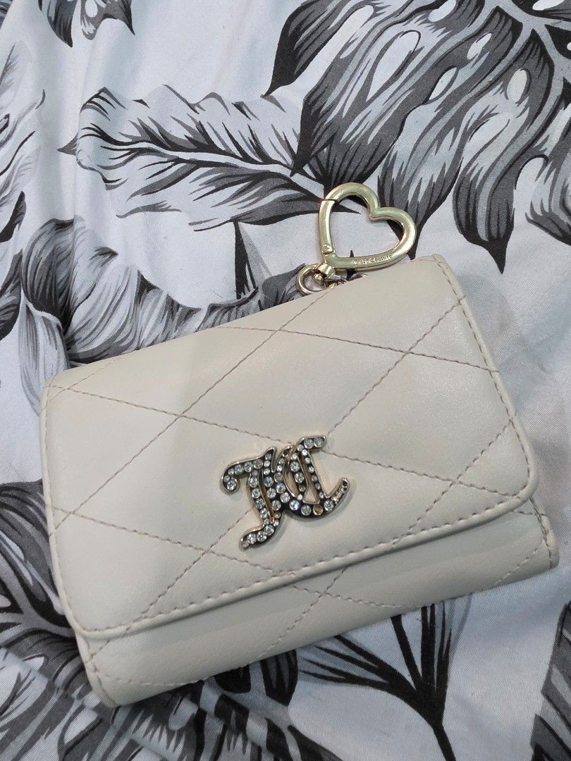 Juicy couture (Category: Wallets & Card Holders) located in Agdangan. Submitted by closetbysamita (Listing ID 1469501997, Image 1). Description: juicy couture wallet like new but stones incomplete still beautiful original juicy couture fron Marshalls Canada Php 500 swerte wallet! always may laman :).