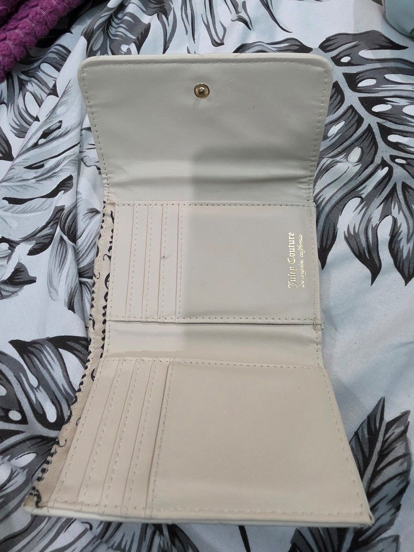 Juicy couture (Category: Wallets & Card Holders) located in Agdangan. Submitted by closetbysamita (Listing ID 1469501997, Image 2). Description: juicy couture wallet like new but stones incomplete still beautiful original juicy couture fron Marshalls Canada Php 500 swerte wallet! always may laman :).
