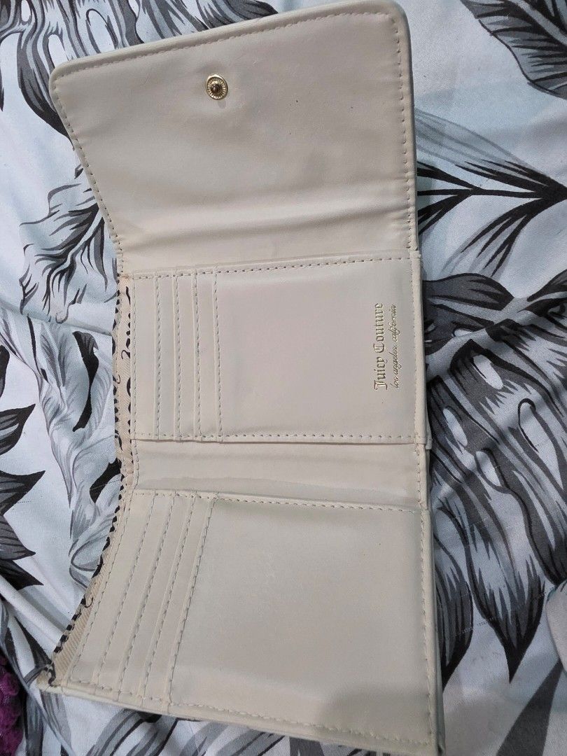 Juicy couture (Category: Wallets & Card Holders) located in Agdangan. Submitted by closetbysamita (Listing ID 1469501997, Image 3). Description: juicy couture wallet like new but stones incomplete still beautiful original juicy couture fron Marshalls Canada Php 500 swerte wallet! always may laman :).