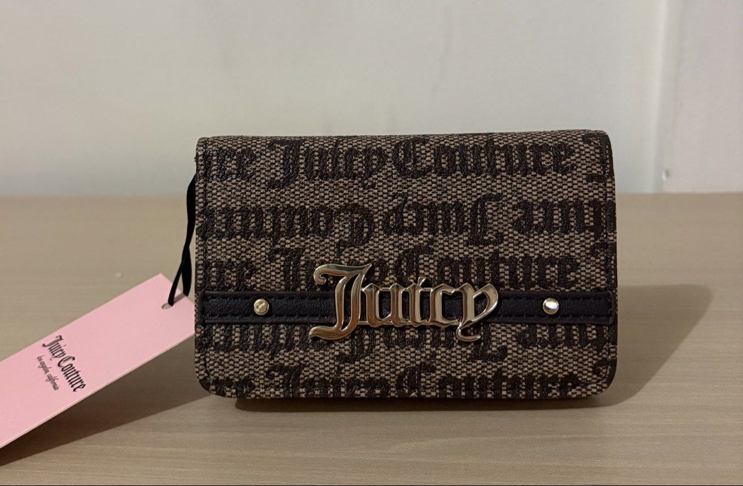 Juicy Couture Monogram Bifold Wallet (Category: Wallets & Card holders) located in Cavite. Submitted by chubbsavenue (Listing ID 1469455985, Image 1). Description: .