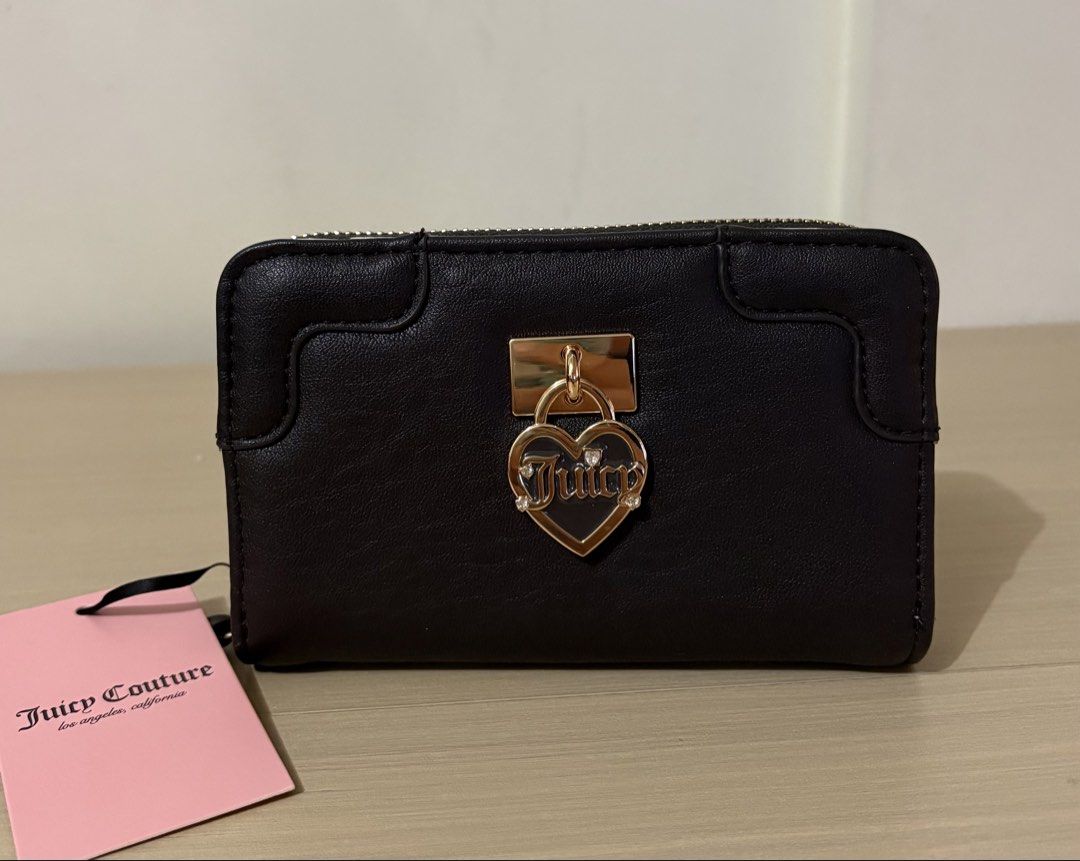 Juicy Couture multi-compartment bifold zip-around Wallet (Category: Wallets & Card holders) located in Cavite. Submitted by chubbsavenue (Listing ID 1469455642, Image 1). Description: .