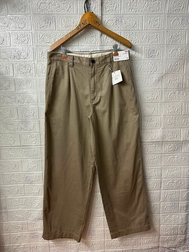 j.wanderson X UNIQLO (Category: Chinos) located in Bacoor. Submitted by arlenelamery (Listing ID 1469527453, Image 1). Description: J WANDERSON X UNIQLO PLEATED WIDE CHINO PANTS BEIGE BRANDNEW WITH HANGTAG AUTHENTIC NO ISSUE SIZE ACTUAL VIA TAPE MEASURE W32 L40 HEM 9.5 PRICE 990 + SF PM MODE OF PAYMENT TRU GCASH LOC CAVITE.