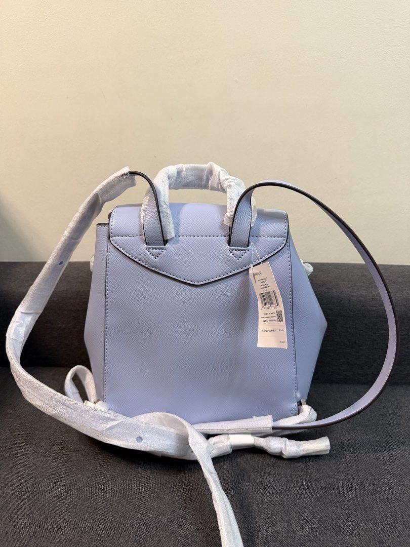 Kate Spade Lizzie Medium Flap Backpack Candied Lilac (Category: Backpacks) located in Quezon City. Submitted by pam07pam (Listing ID 1469478423, Image 3). Description: - Brand: Kate Spade - Style: Lizzie Medium Flap Backpack - Color: Candied Lilac - Orig Price: $359 - Material: Durable Saffiano Leather - Closure: Drawstring top with magnetic flap - Hardware: Gold-tone with metal front logo lettering - Straps: Top carry handle and adjustable shoul