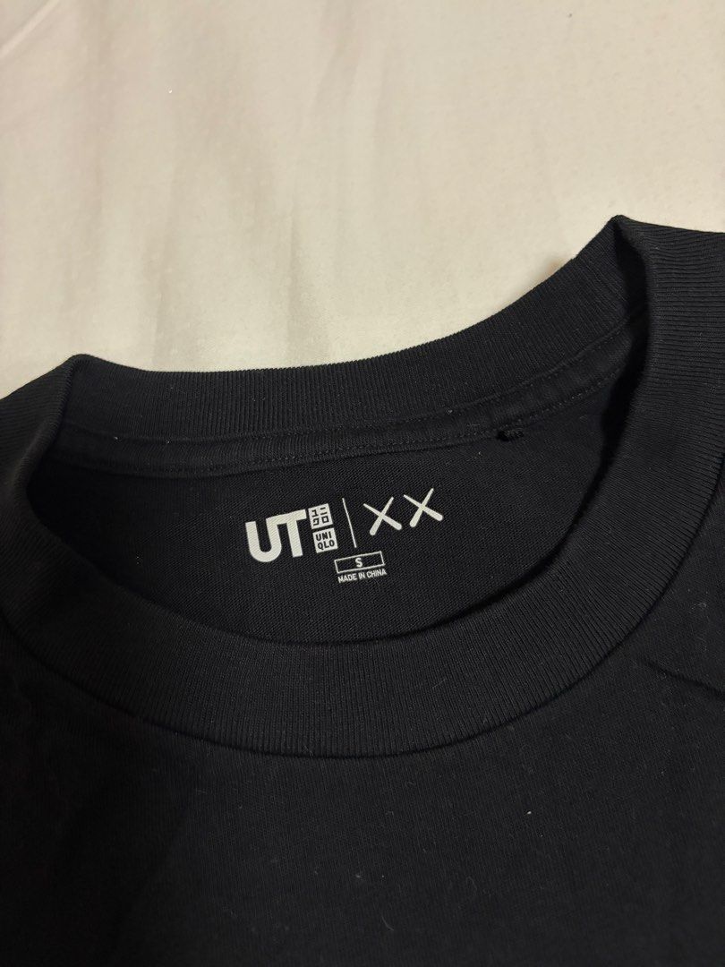 Kaws x Uniqlo Shirt (Category: Tshirts & Polo Shirts ) located in Pasig City. Submitted by chamoisee (Listing ID 1469516244, Image 3). Description: Kaws x Uniqlo Shirt small on tag 18.5”x24”.