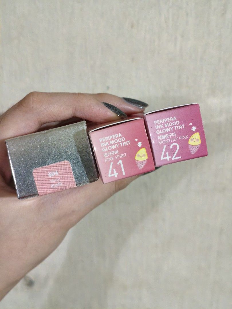 Kbeauty Lip Tints (PeriPera and Laka) (Category: Makeup) located in Mandaluyong City. Submitted by aeurea (Listing ID 1469561093, Image 2). Description: - Peripera Ink Mood Glowy Tints (Shades 41 Pink Spirit & 42 Monthly Pink) - Laka item (Shade 604 Misty) - Swatched only. Applicator cleaned with alcohol after swatching. 200 each❗Get 3 for 500❗ RFS: Decluttering .