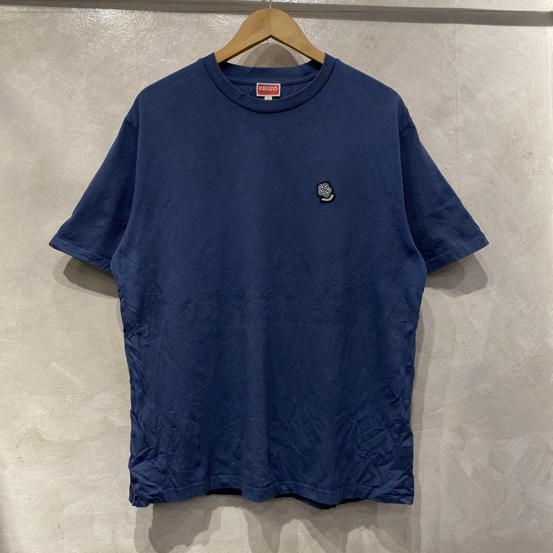 Kenzo Nigo Era Embroided Tee (Category: Luxury Apparel) located in Quezon City. Submitted by rebirthalley (Listing ID 1469463147, Image 2). Description: Width-22 Length-27.5 Sleeve-9 Shoulder-19 Hem-22 Excellent Condition Need wash only Cut washtag but authentic.