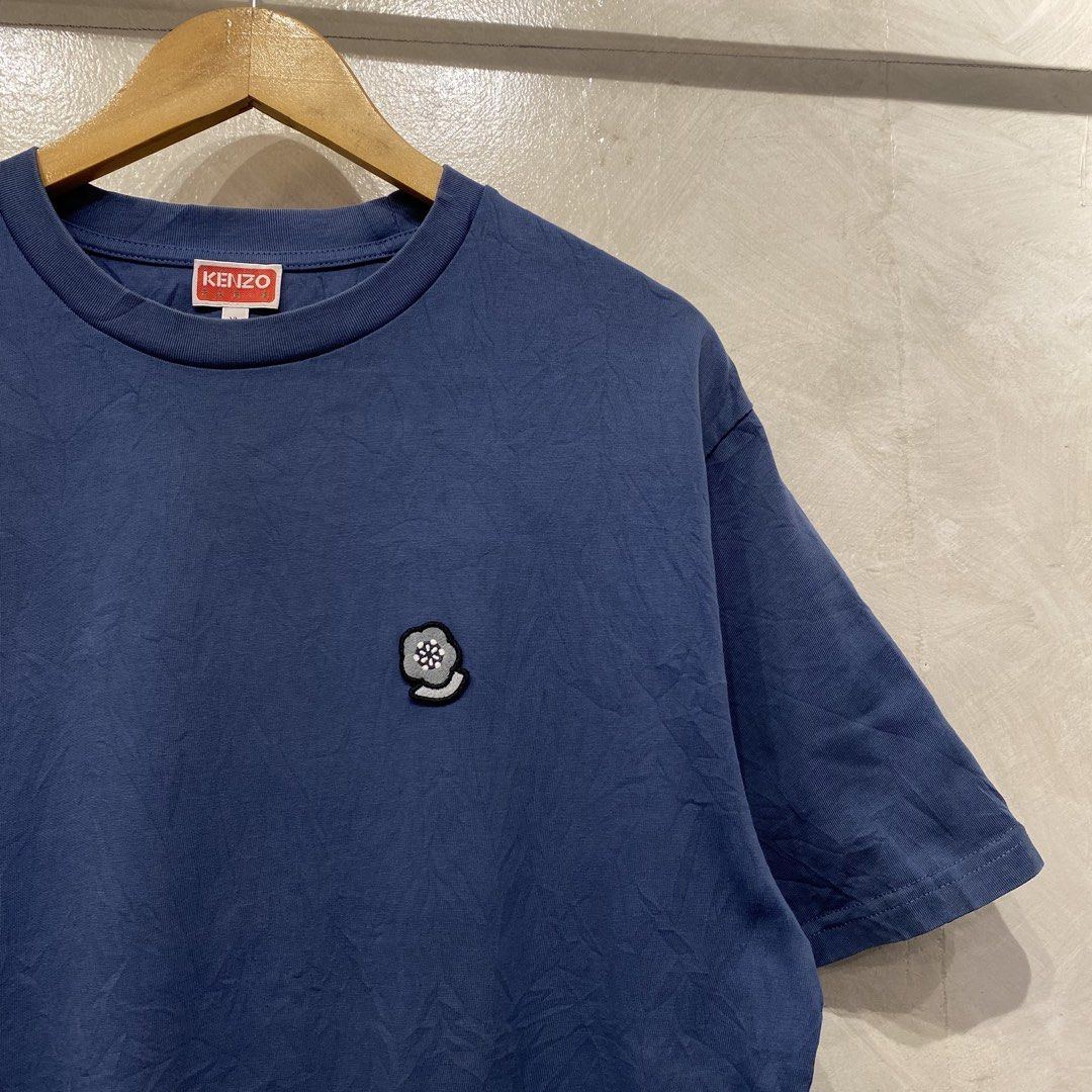 Kenzo Nigo Era Embroided Tee (Category: Luxury Apparel) located in Quezon City. Submitted by rebirthalley (Listing ID 1469463147, Image 3). Description: Width-22 Length-27.5 Sleeve-9 Shoulder-19 Hem-22 Excellent Condition Need wash only Cut washtag but authentic.