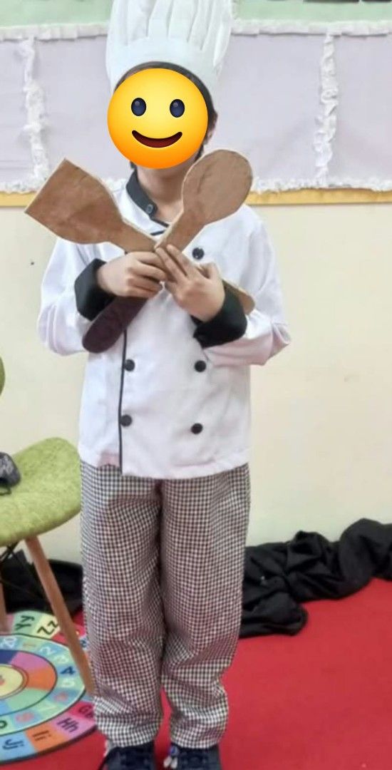 Kids Chef Costume (Category: Babies & Kids Fashion) located in Las Pinas. Submitted by hmq43 (Listing ID 1469552414, Image 1). Description: Kids chef costume. White jacket with black piping, double-breasted buttons, and matching black-and-white checkered trousers. (TALL CHEF HAT and WOODEN UTENSILS not INCLUDED). Great for school events, dress-up days, or cooking fun at home. Fits young children. Clean and well kept. FIT to 6-9 yrs old.
