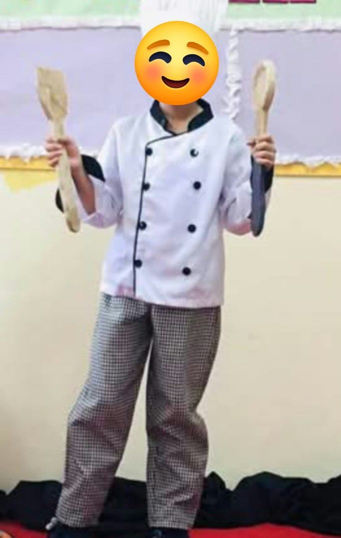 Kids Chef Costume (Category: Babies & Kids Fashion) located in Las Pinas. Submitted by hmq43 (Listing ID 1469552414, Image 2). Description: Kids chef costume. White jacket with black piping, double-breasted buttons, and matching black-and-white checkered trousers. (TALL CHEF HAT and WOODEN UTENSILS not INCLUDED). Great for school events, dress-up days, or cooking fun at home. Fits young children. Clean and well kept. FIT to 6-9 yrs old.
