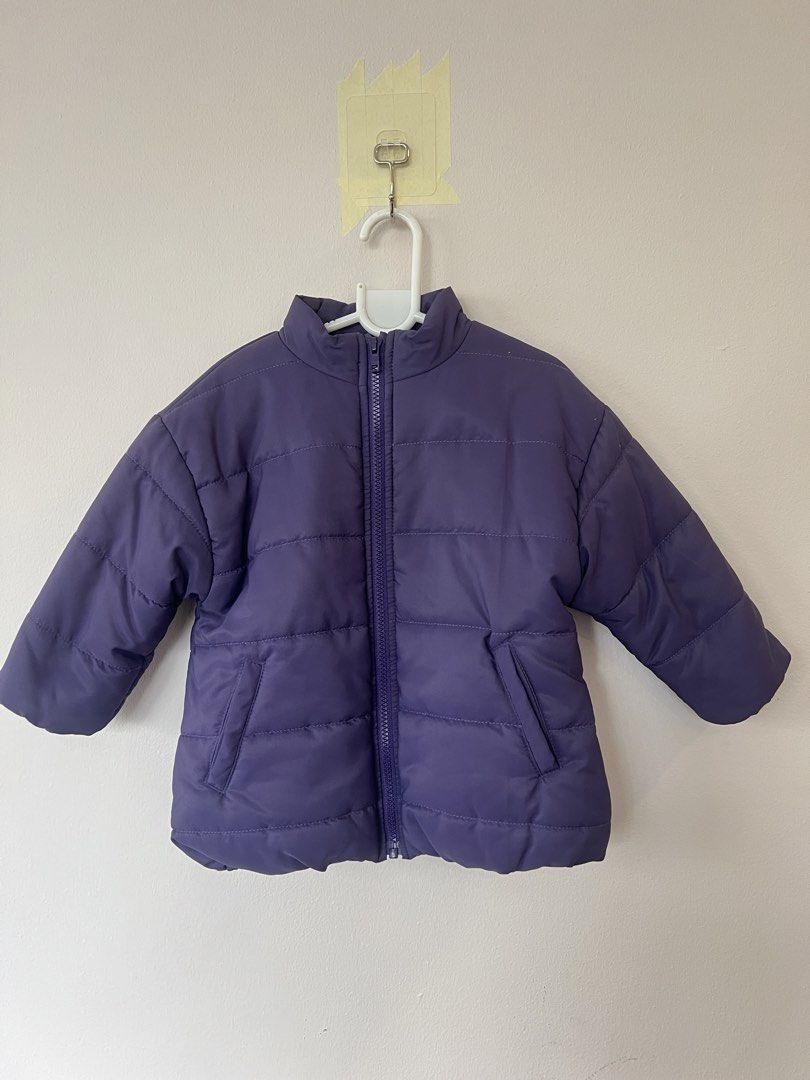 Kids Puffer Jacket Purple Size 100 (Category: Babies & Kids Fashion) located in San Fernando. Submitted by wearvfs (Listing ID 1469510049, Image 1). Description: - Brand/Item: Markey's Big Field Purple Puffer Jacket for Kids - Size: 100 (Tag attached, approx. 43 cm length) .