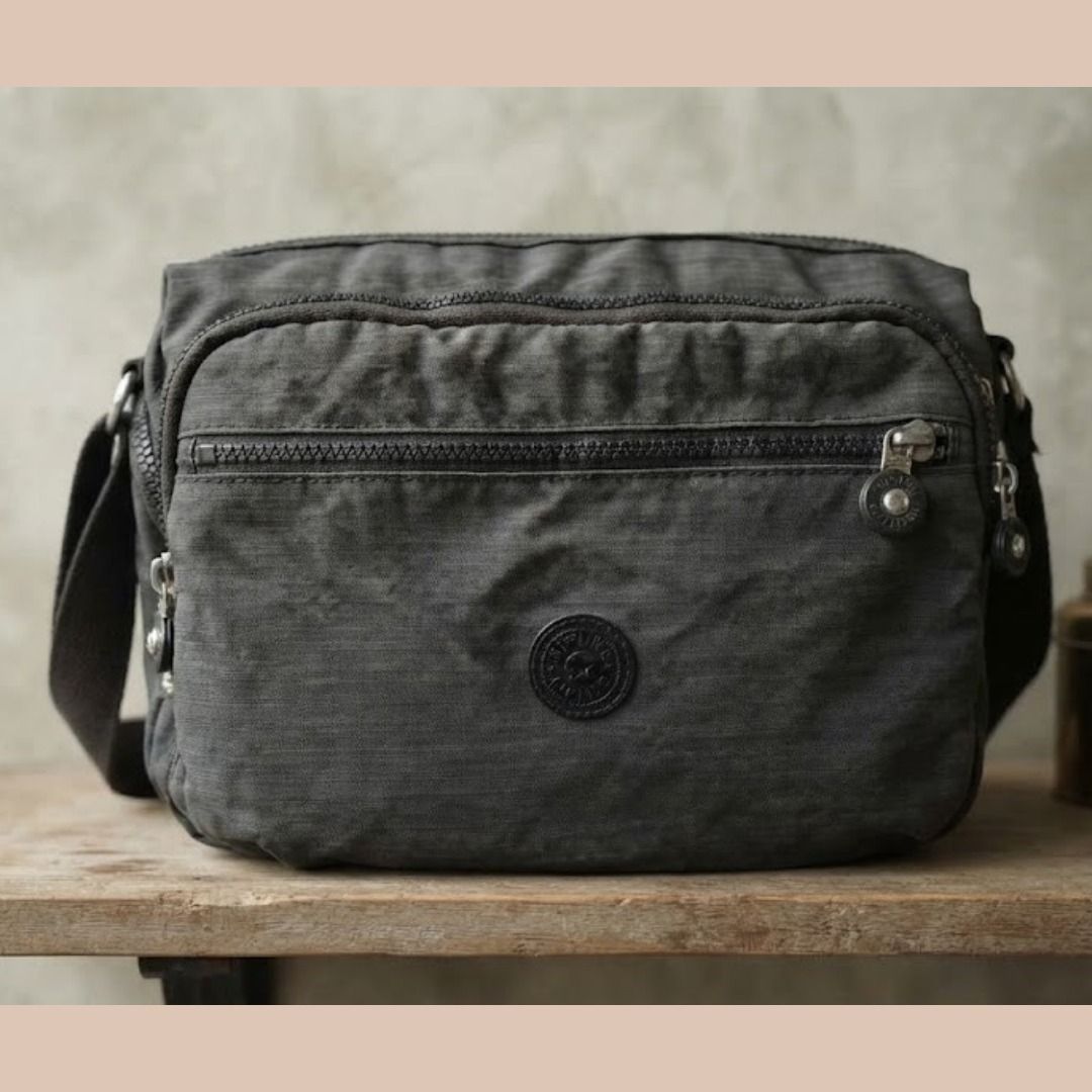 Kipling Grey Crossbody Bag with Multiple Pockets (Category: Cross-body Bags) located in Quezon City. Submitted by eilgaraje (Listing ID 1469509043, Image 1). Description: crossbody bag na super functional at sulit ang presyo, may minor honest flaws man, pero all goods pa rin para sa pang-araw-araw!.
