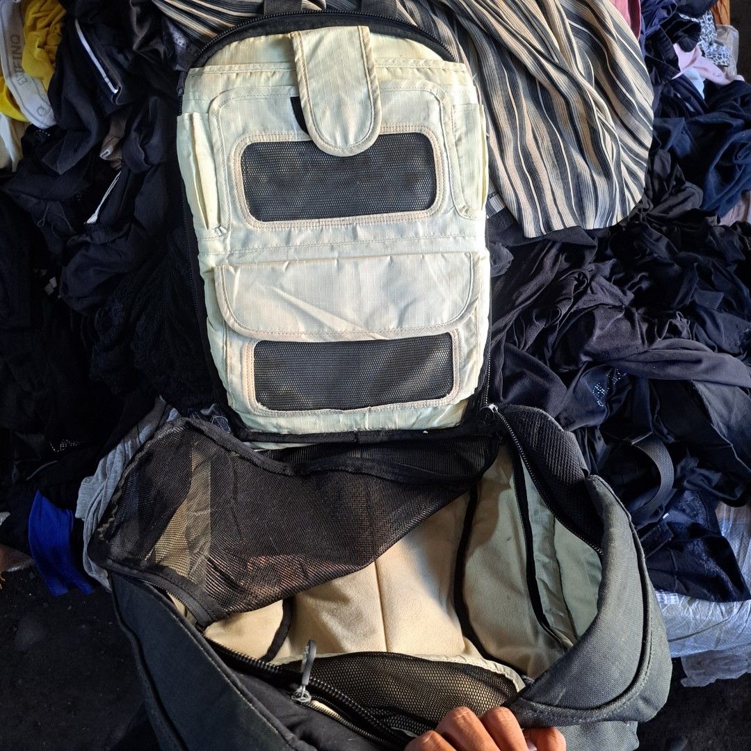 Krumpler Black Backpack with Multiple Compartments (Category: Backpacks) located in Manila. Submitted by warmphoenix_5fc5b2 (Listing ID 1469486944, Image 2). Description: - Brand: Krumpler - Color: Classic dark gray - Material: Sturdy, durable canvas - Design: Wide-opening main compartment for easy access - Organization: Lots of internal mesh pockets for gear - Comfort: Padded back panel - Details: Custom branded zipper pulls on all closures - Co