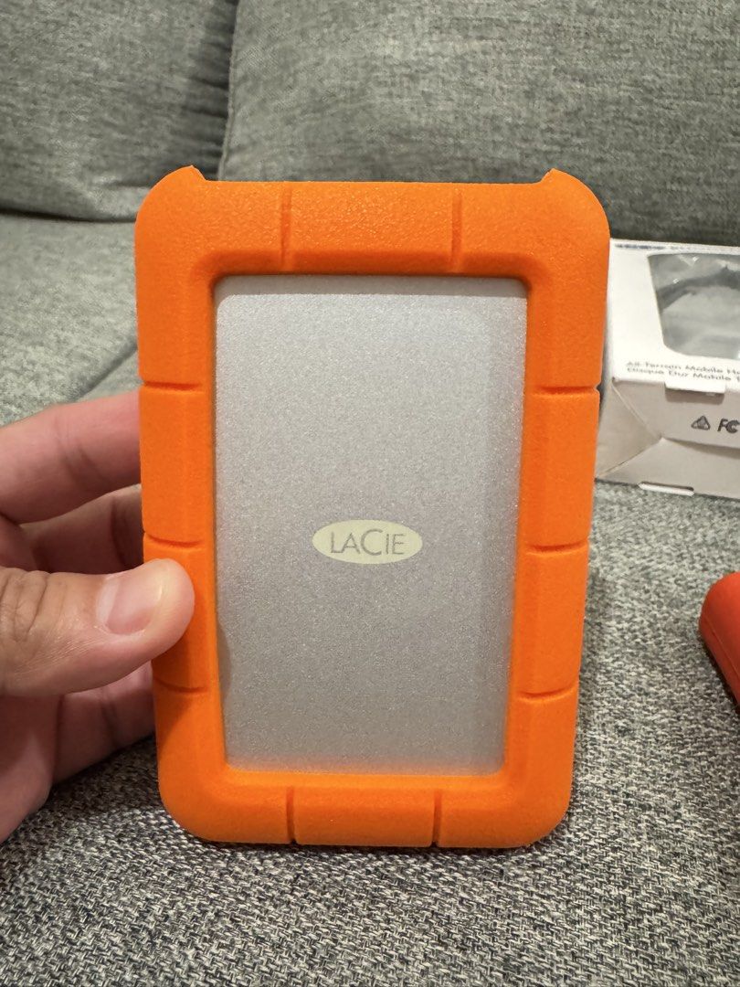 LaCie Rugged Mini 5TB All-Terrain External Hard Drive (Category: Hard Disks & Thumbdrives) located in Cainta. Submitted by dj_tom (Listing ID 1469525210, Image 1). Description: 🔥 FOR SALE — LaCie Rugged Mini External Hard Drive | 5TB 💾 Price: ₱14,999 EACH Details: * Brand: LaCie Rugged Mini External Hard Drive * Capacity: 5TB * Condition: Brand new, opened only for inspection and testing * Protection: Iconic orange and orange -red rubber bumper