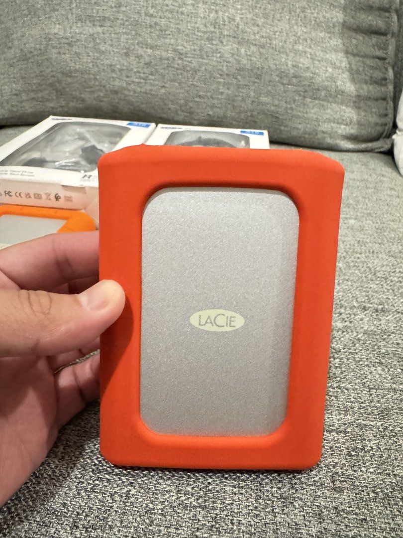 LaCie Rugged Mini 5TB All-Terrain External Hard Drive (Category: Hard Disks & Thumbdrives) located in Cainta. Submitted by dj_tom (Listing ID 1469525210, Image 2). Description: 🔥 FOR SALE — LaCie Rugged Mini External Hard Drive | 5TB 💾 Price: ₱14,999 EACH Details: * Brand: LaCie Rugged Mini External Hard Drive * Capacity: 5TB * Condition: Brand new, opened only for inspection and testing * Protection: Iconic orange and orange -red rubber bumper