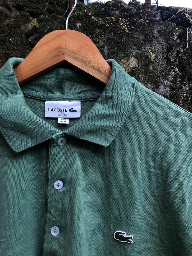 Lacoste (Category: Formal Shirts) located in Manila. Submitted by lumang__gamit00 (Listing ID 1469456782, Image 3). Description: Lacoste Polo Khaki Green Size: 6 Width: 20.5 Length: 27 Good Condition Issue: cut wash.