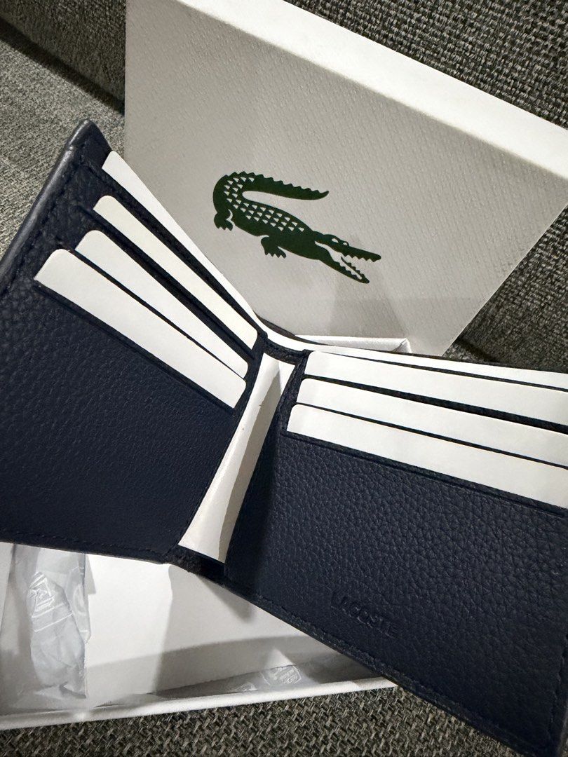 LACOSTE (Category: Wallets & Card Holders) located in Quezon City. Submitted by glamshoppers101 (Listing ID 1469516656, Image 3). Description: New Original with box From Canada SF: c/o buyer Location: Quezon City.
