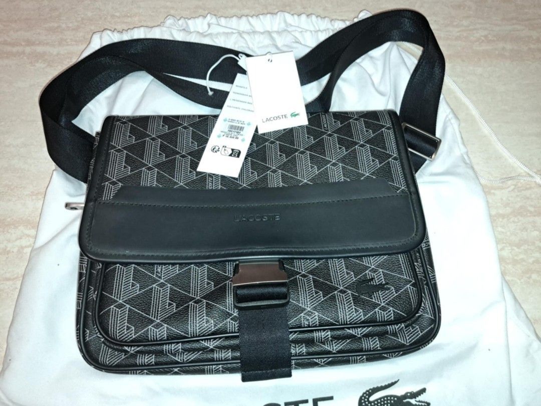 Lacoste - The Blend Flap Close Bag (Category: Luxury Bags & Wallets) located in Makati City. Submitted by awcs101_trading (Listing ID 1469430771, Image 3). Description: NH4411LX model Unisex Bag No box, paperbag, just pouch Price slighlty negotiable RFS: Addtl budget for Iphone.