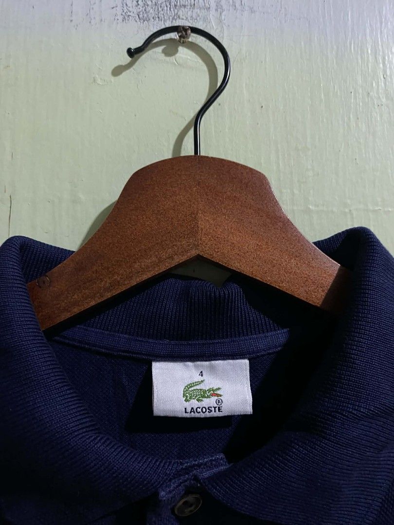 Lacoste Black (Category: Formal Shirts) located in Ajuy. Submitted by anniee_tee (Listing ID 1469493162, Image 2). Description: Excellent Condition No issue Color Rate: 9.5/10 Dimes: 20W x 26L.