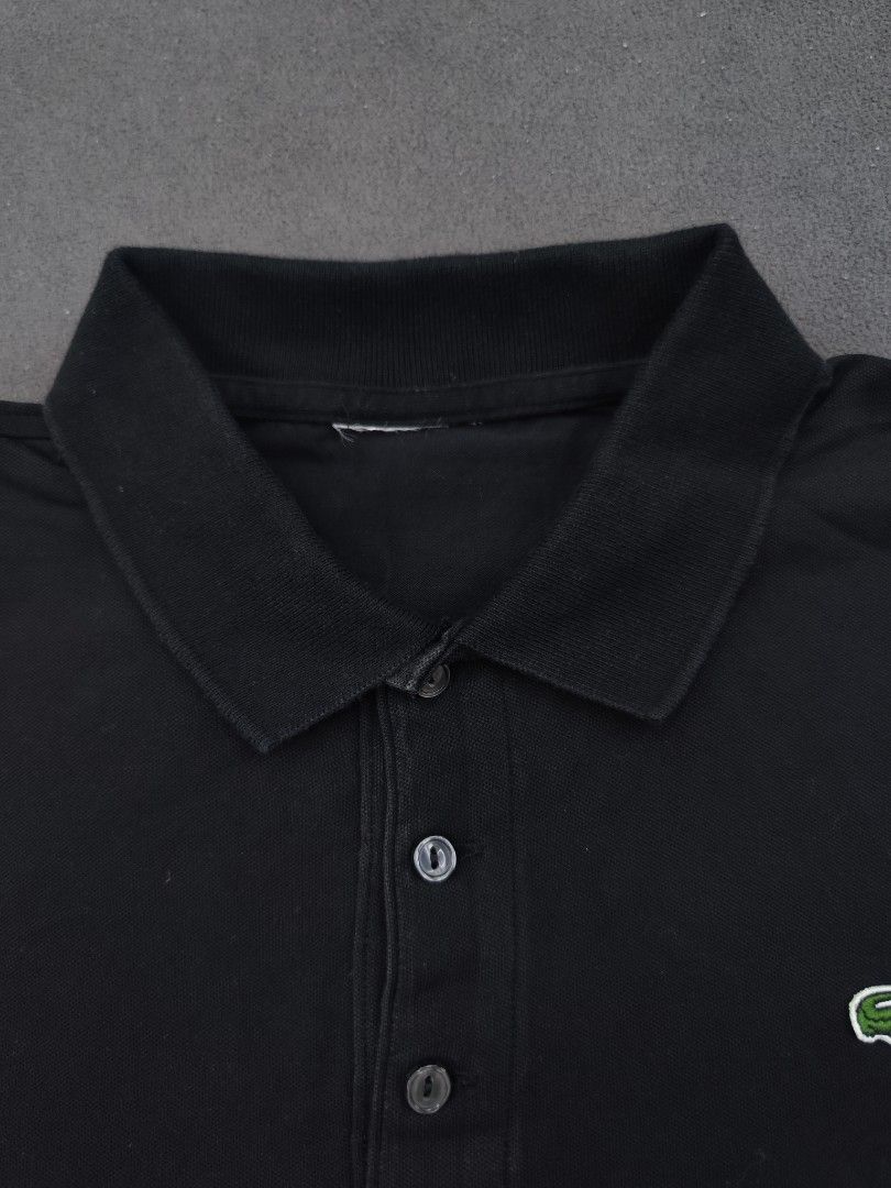Lacoste Black Polo Shirt (Category: Tshirts & Polo Shirts ) located in Bulacan. Submitted by emilj23 (Listing ID 1469434822, Image 3). Description: Lacoste Black Polo Shirt Size M-L L 26.5 W 21 Condition 9.5/10 Color rate 9.5/10 Issue Cut Neck tag.