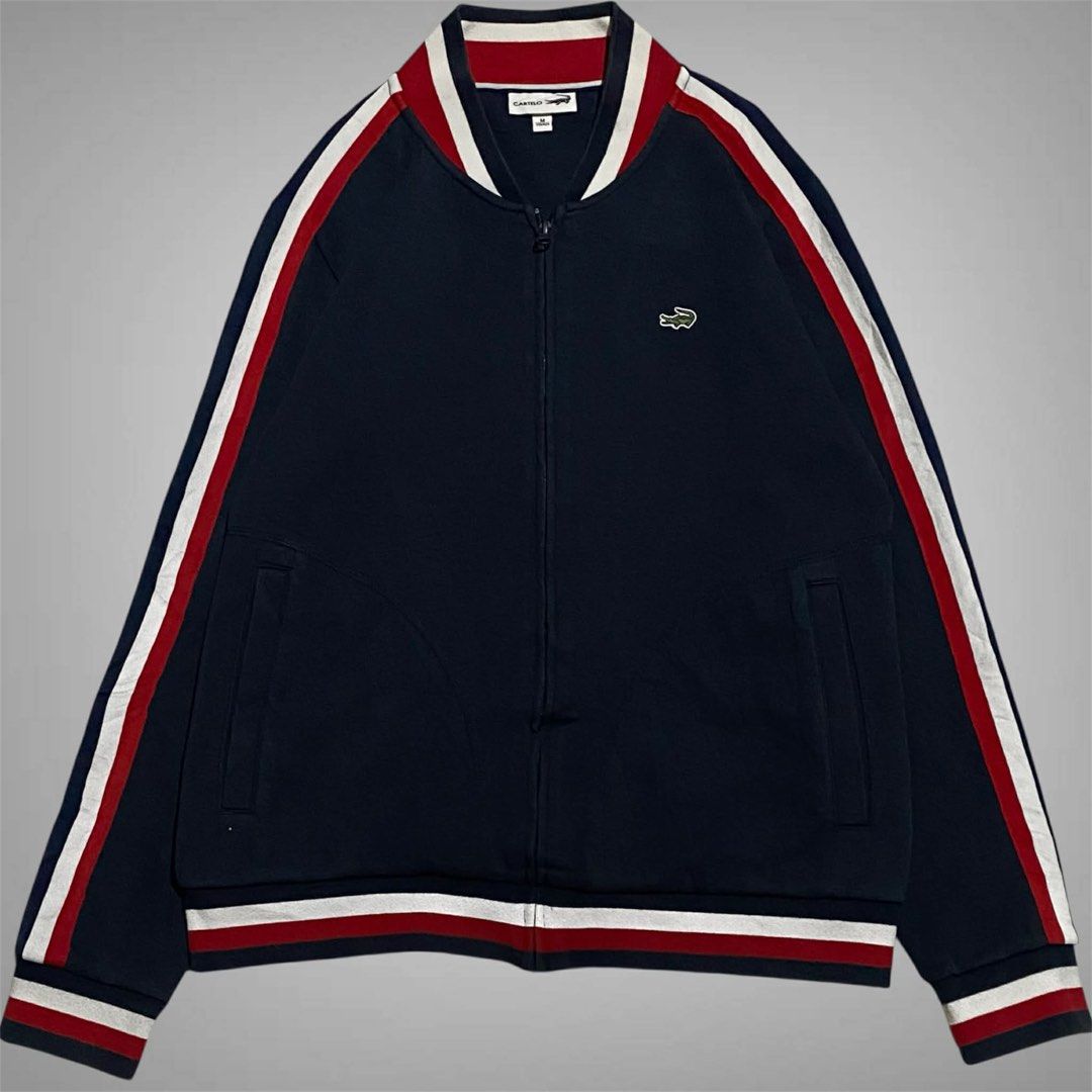 Lacoste Bombe Jacket Cartelo (Category: Coats, Jackets and Outerwear) located in Mabalacat. Submitted by stellargarments (Listing ID 1469423872, Image 1). Description: Length : 26 Width : 22 Condition : 8.5/10 GANDA NG DETAILS GANDA NG TELA WITH 2 POCKETS SMOOTH ZIPPER SUPER NICE & KINIS! VERY COMFY & SMOOTH ON SKIN COLOR MAY VARY DUE TO LIGHTING NEED WASH NO MAJOR STAIN FRESH FROM BALE.
