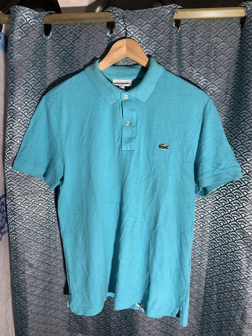 LACOSTE BRIGHT TURQUOISE POLO SHIRT (Category: Tshirts & Polo Shirts ) located in Paranaque City. Submitted by thrift-matters (Listing ID 1469405203, Image 1). Description: ▪️Dimes: 19L x 26L ▪️Color rate: 9.7/10 ▪️As New Condition ▪️Guaranteed Authentic 100% ▪️With Neck tag but cut washtag .