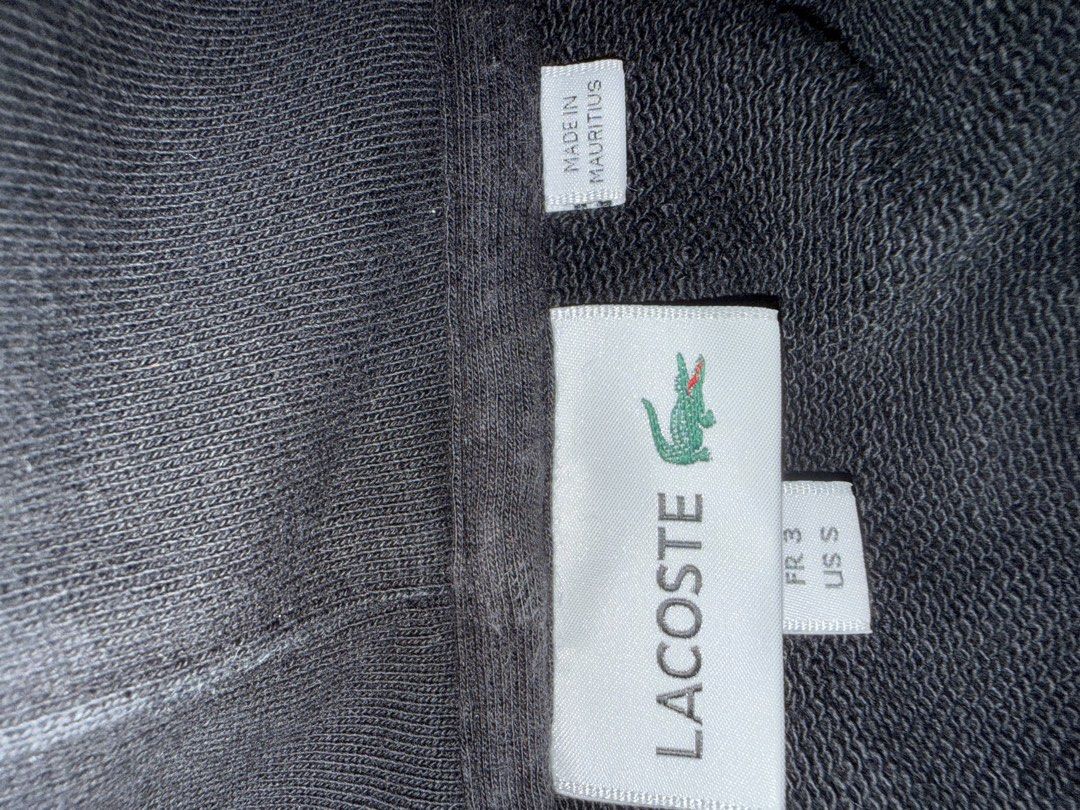 Lacoste Hoody (Category: Coats, Jackets and Outerwear) located in Pasig City. Submitted by almond_stuff (Listing ID 1469409104, Image 3). Description: Pls check photos for the flaw From US Decluttering.
