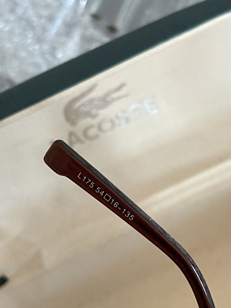 Lacoste L175 Aviator Sunglasses Brown (Category: Sunglasses & Eyewear) located in Baguio. Submitted by gbwardrobe (Listing ID 1469447385, Image 3). Description: - Brand: Lacoste (Made in Paris) - Model: L175 (54-16-135) Found my moms lacoste glasses. Havent been used recently this the nose pad. You can have it change to a lacoste shop..