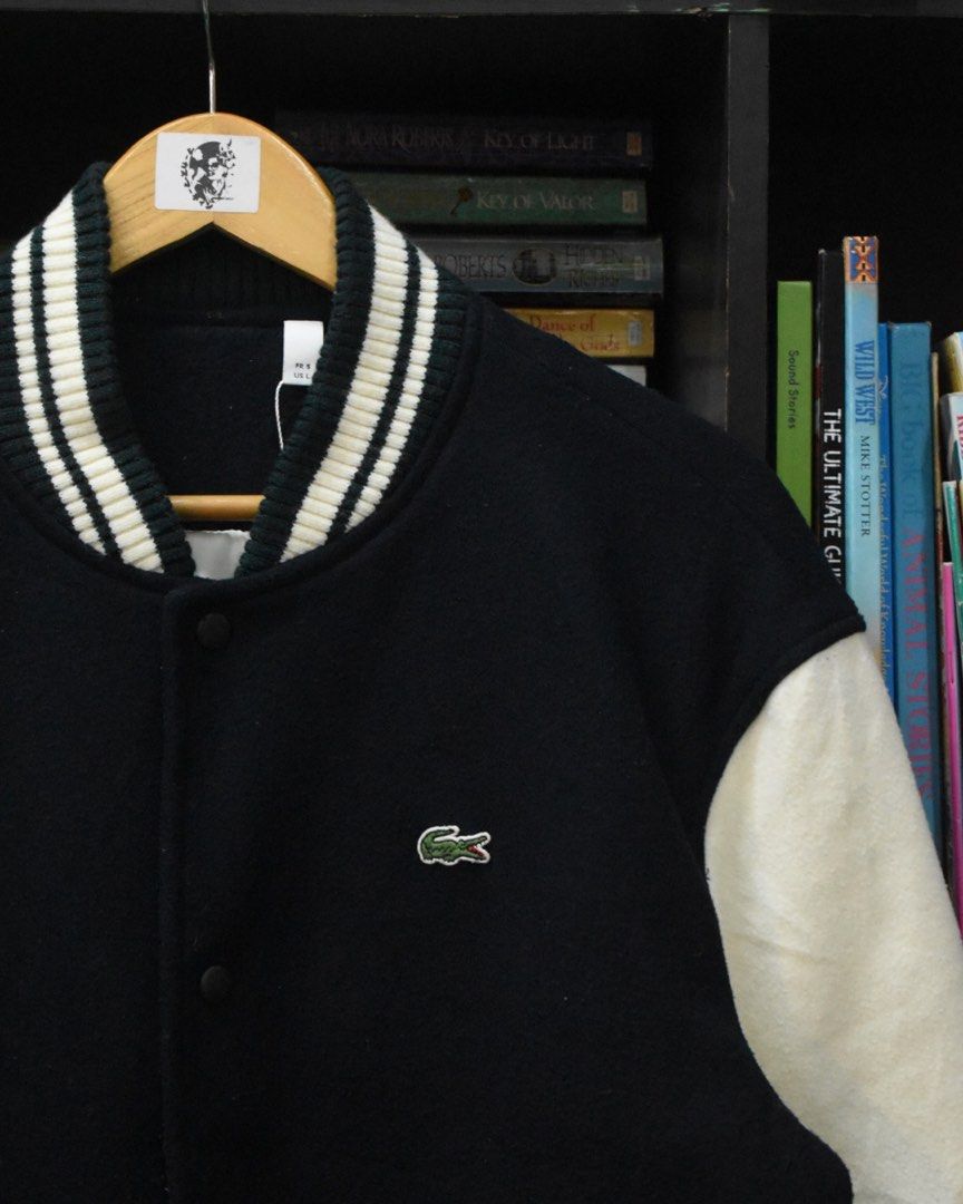 Lacoste Navy/White Diamond Quilted Lined Varsity Jacket (Category: Coats, Jackets and Outerwear) located in Baguio. Submitted by marcusmartin2600 (Listing ID 1469496477, Image 2). Description: Size: Large on tag Condition: Excellent | signs of usage 📏 Measurement via Tape Measure (in inches): Chest width: 24” Length: 25” Shoulders: 21.5” Sleeve Length: 26” Hem: 22” . ————————— Note: Please check and ask for detailed photos before buying to avoid
