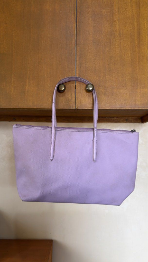 LACOSTE PINK TOTE BAG (Category: Shoulder Bags) located in Manila. Submitted by urban.vintage (Listing ID 1469443580, Image 2). Description: ISSUE: NONE (NEED WASH) MOP :GCASH (NO COD) SHIP VIA: LALAMOVE & J&T LOCATION: PASIG CITY .
