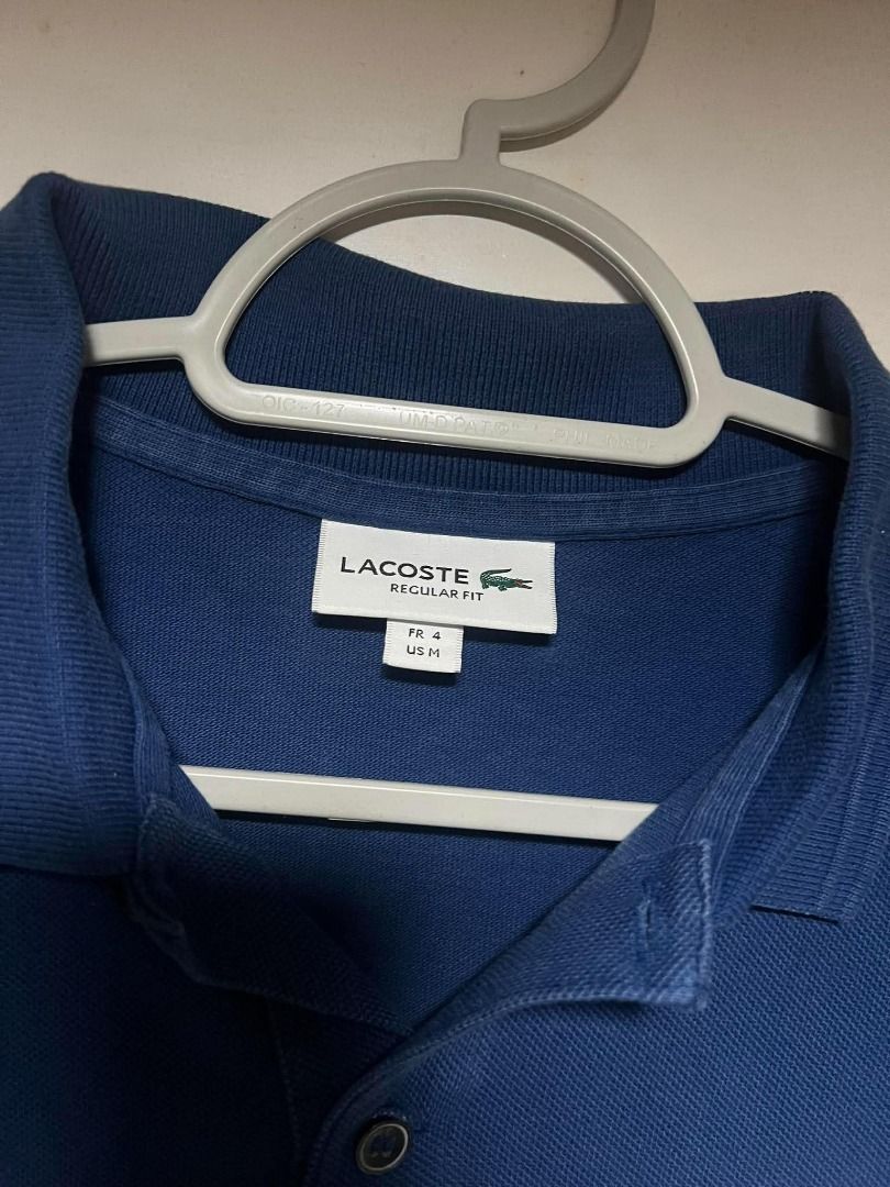 Lacoste Polo (Category: Tshirts & Polo Shirts ) located in Mandaluyong City. Submitted by santideclutters (Listing ID 1469530227, Image 3). Description: size: 28L 20.5W (L) color rate: 9/10 condition: 10/10 COLOR MAY VARY DUE TO LIGHTING.