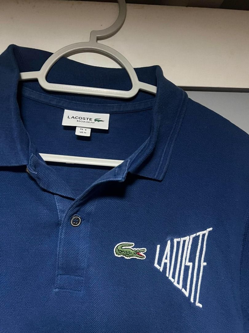 Lacoste Polo (Category: Tshirts & Polo Shirts ) located in Mandaluyong City. Submitted by santideclutters (Listing ID 1469530227, Image 2). Description: size: 28L 20.5W (L) color rate: 9/10 condition: 10/10 COLOR MAY VARY DUE TO LIGHTING.