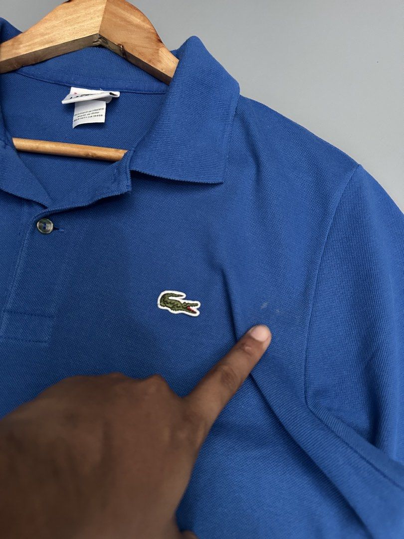 Lacoste Polo Shirt (Category: Activewear) located in Manila. Submitted by thriftavenueph (Listing ID 1469428343, Image 3). Description: Fs: Lacoste Polo Shirt Size: 22x30, L Condition: excellent, 10/10 color, have a minimal stain need wash only Price: 950.