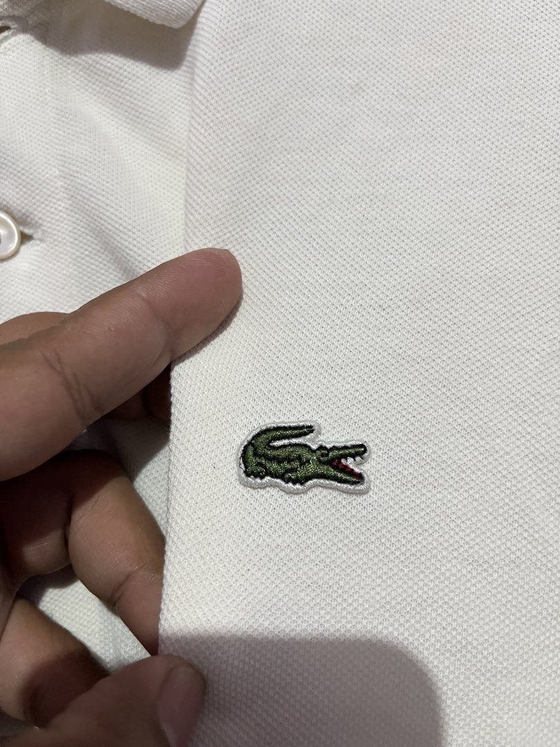 Lacoste Polo Shirt (Category: Tshirts & Polo Shirts ) located in Tumauini. Submitted by jomerthrift (Listing ID 1469541284, Image 3). Description: Dimes: 22.5x29 Size: XL Color rate: 9.5/10 No issue.