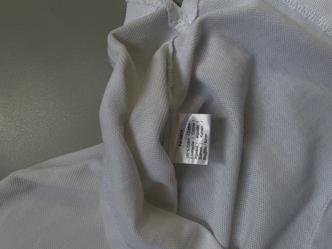 Lacoste Polo shirt White (Category: Tshirts & Polo Shirts ) located in Marawi City. Submitted by madythrift (Listing ID 1469466795, Image 3). Description: 18.5 by 27 Excellent Condition Nego!.